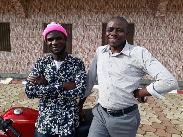 Ezekiel (right) and Moses (left) in front of their bike