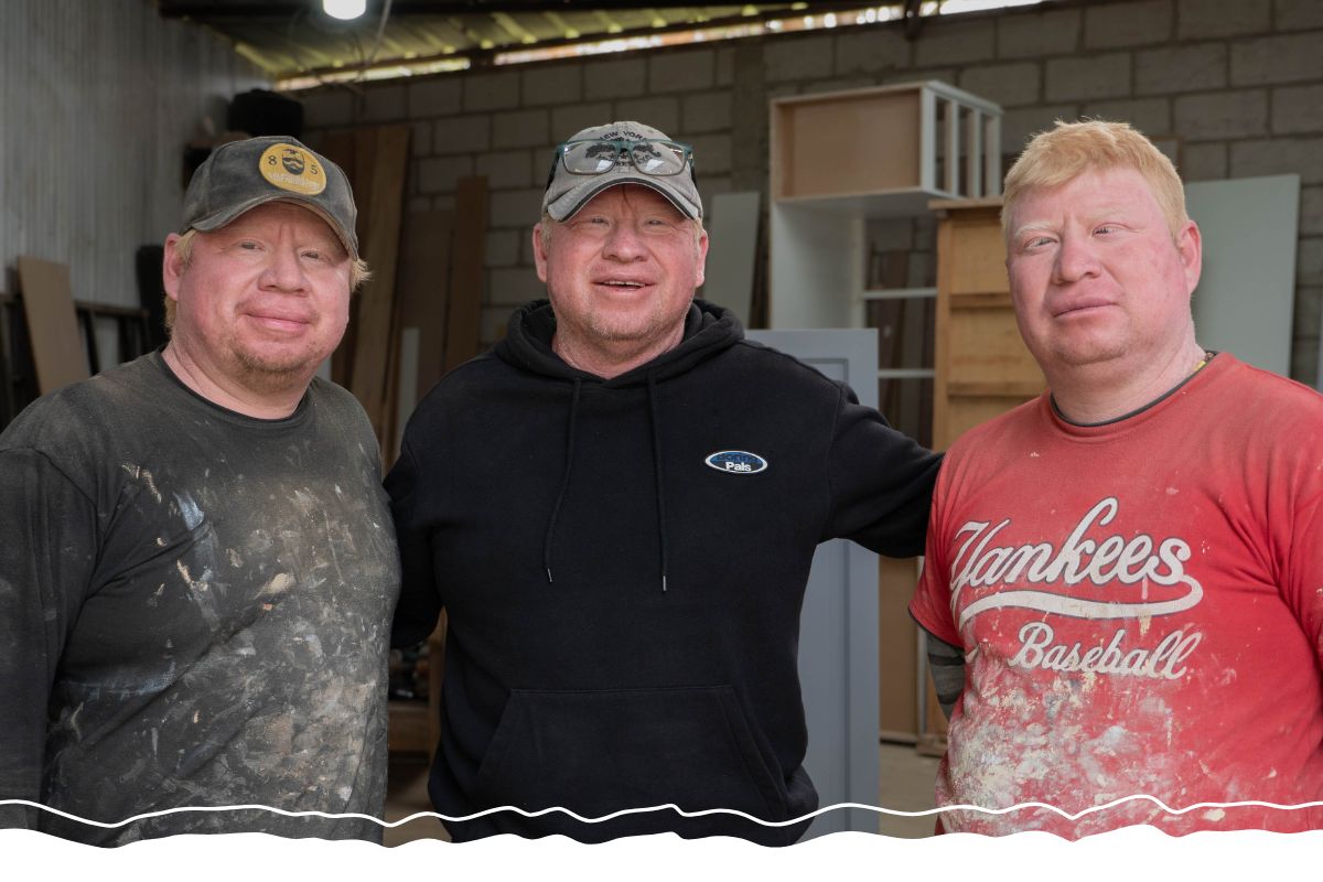 Through the Partners Worldwide network, Marco (center) and his brothers had all they needed to grow their woodworking business. 