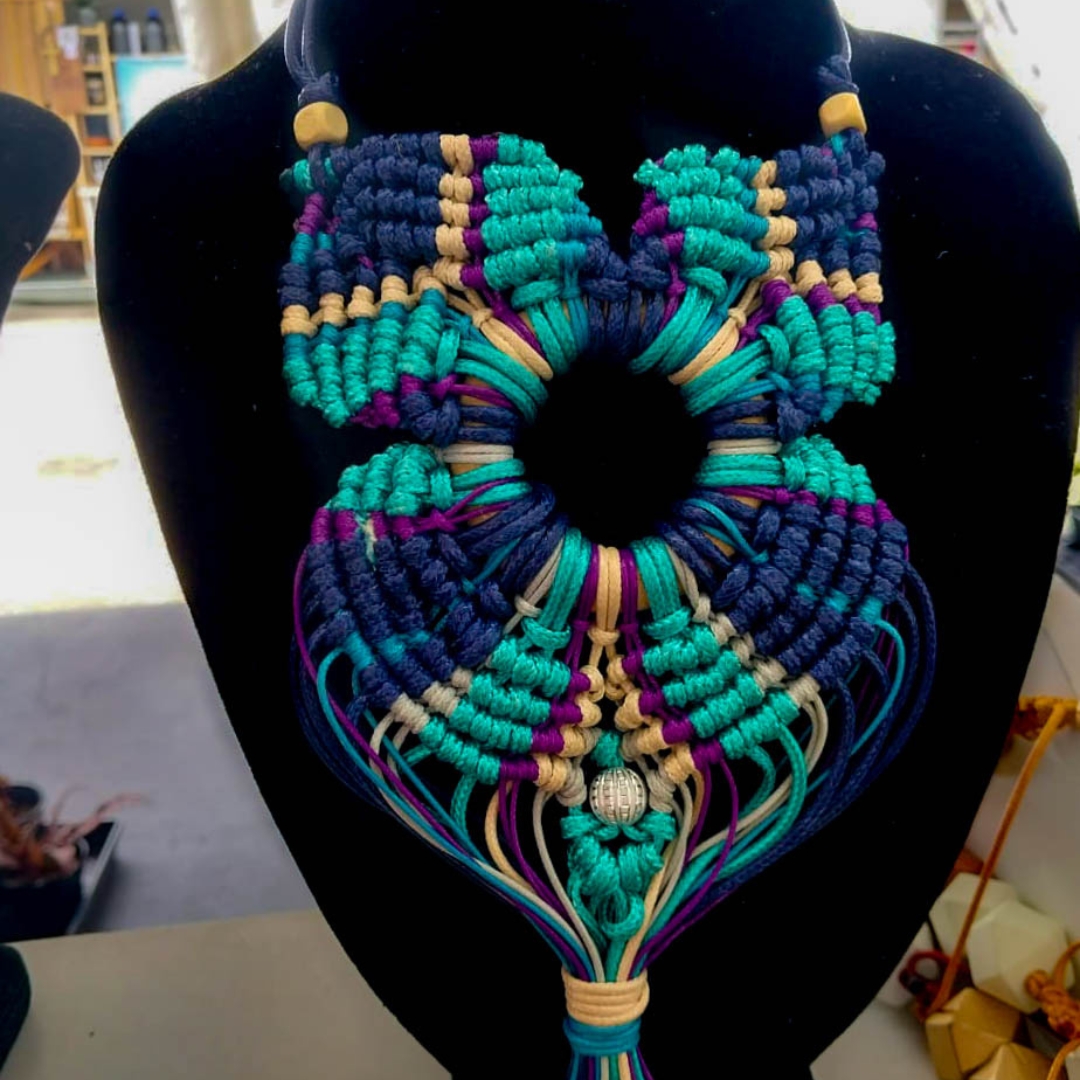 a blue macrame necklace
